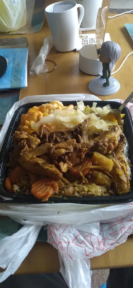 Curry Chicken with Peas and Rice and Cabbage Mac and Cheese